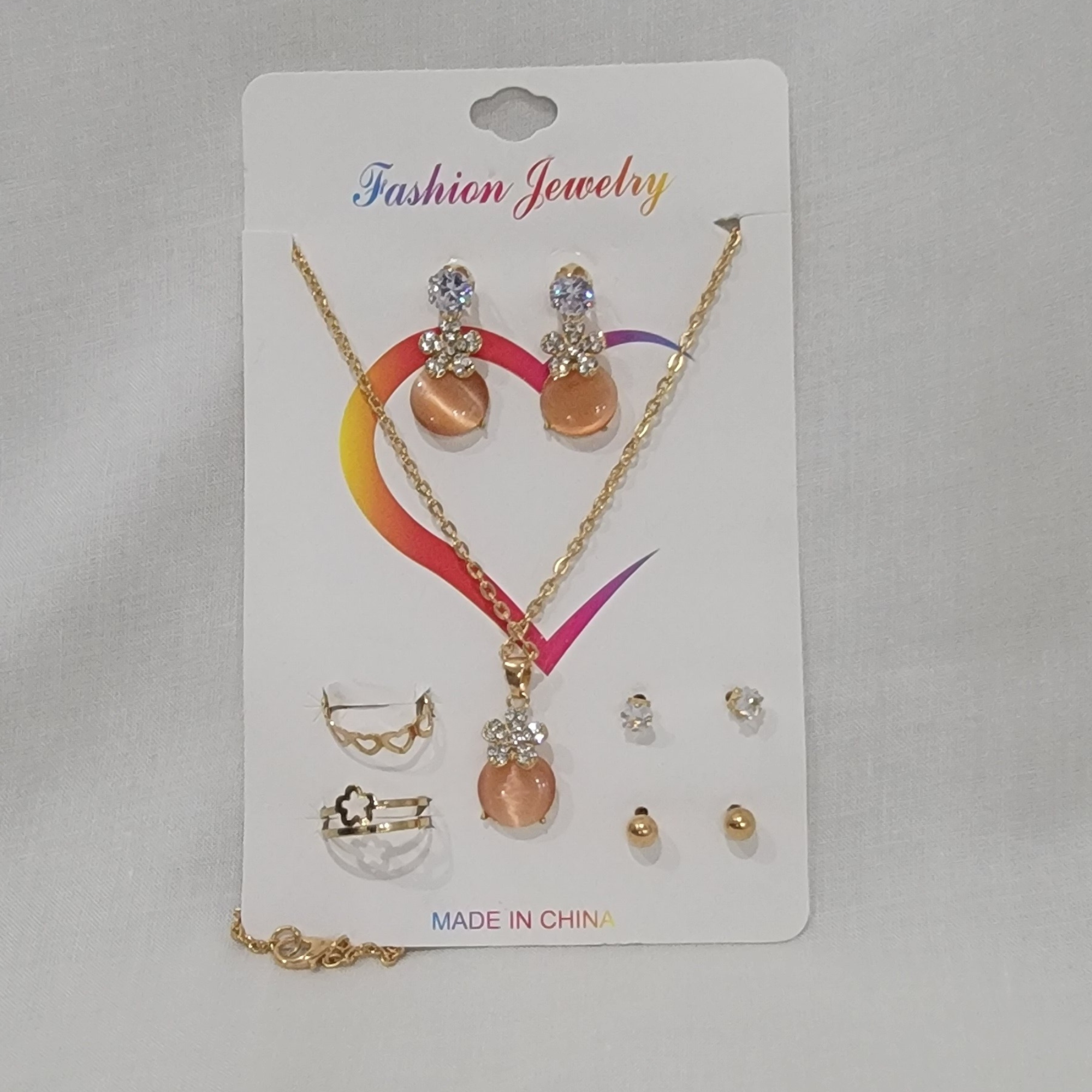 chain necklace with earing rings and topus